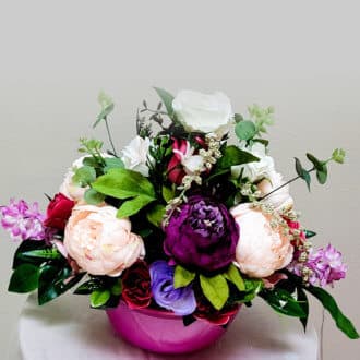 bouquet in a pink container