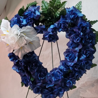 heart shaped wreath with blue flowers