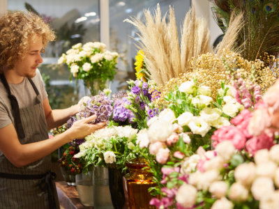 florist takes care of the fresh cut flowers